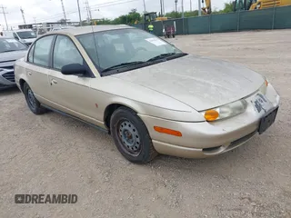 2002 Saturn SL z VIN 1G8ZK52732Z131361, wystawiony jako IAAI lot #42358215 z przebiegiem 228 184 mil mil oraz . Historia ofert i sprzedaży dostępna na DreamBid. Obrazek 1.