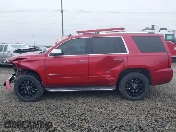 2015 Chevrolet Tahoe LTZ z VIN 1GNSKCKC6FR276531, wystawiony jako IAAI lot #41692617 z przebiegiem 124 010 mil mil oraz . Historia ofert i sprzedaży dostępna na DreamBid. Obrazek 14.
