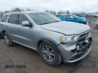 2015 Dodge Durango Limited with VIN 1C4RDJDG2FC907624, listed as a IAAI auction lot 41932086 with 185,104 mi miles. Bid and sale history available at carsss.com. Image 1.