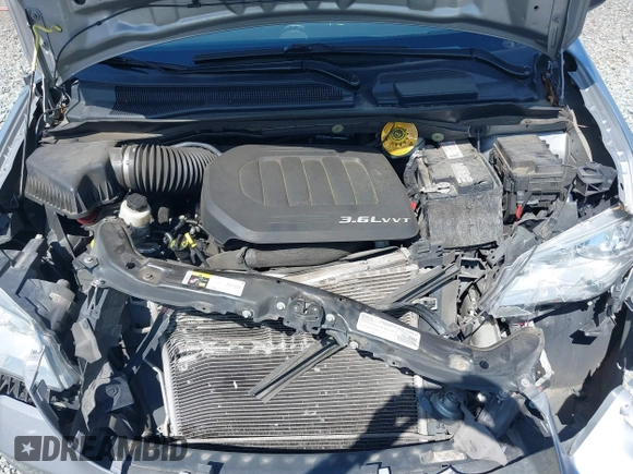 2016 Dodge Grand Caravan SE with VIN 2C4RDGBGXGR220549, listed as a IAAI auction lot 42074110 with 114,826 mi miles and . Bid and sale history available at DreamBid. Image 10.