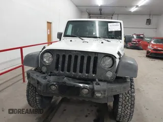 2016 Jeep Wrangler Sport with VIN 1C4AJWAG9GL261958, listed as a IAAI auction lot 41595490 with 32,433 mi miles and . Bid and sale history available at carsss.com. Image 12.