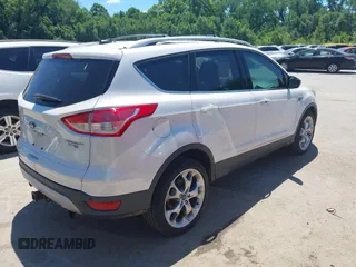 2013 Ford Escape Titanium with VIN 1FMCU9J94DUD32777, listed as a IAAI auction lot 42683798 with 197,857 mi miles and . Bid and sale history available at DreamBid. Image 4.