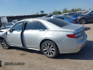 2018 Lincoln Continental Premiere z VIN 1LN6L9PK5J5603376, wystawiony jako IAAI lot #41880976 z przebiegiem Nie podano mil oraz . Historia ofert i sprzedaży dostępna na DreamBid. Obrazek 13.