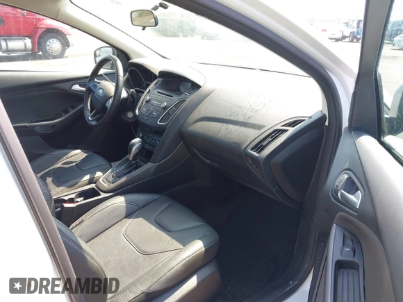 2016 Ford Focus SE with VIN 1FADP3F20GL329898, listed as a IAAI auction lot 42844995 with 20,485 mi miles and . Bid and sale history available at DreamBid. Image 5.