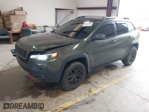 2020 Jeep Cherokee Trailhawk Elite with VIN 1C4PJMBN2LD538076, listed as a IAAI auction lot 42219282 with 53,773 mi miles and . Bid and sale history available at DreamBid. Image 17.