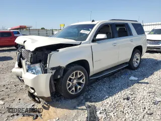 2015 GMC Yukon SLT with VIN 1GKS2BKC4FR101069, listed as a Copart auction lot 74592014 with Not Provided miles and Salvage Title. Bid and sale history available at carsss.com. Image 1.