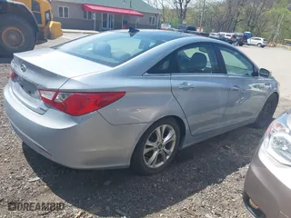 2013 Hyundai Sonata SE with VIN 5NPEC4AC9DH784460, listed as a IAAI auction lot 42099724 with 152,744 mi miles. Bid and sale history available at carsss.com. Image 4.
