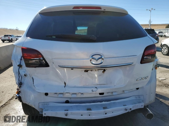 2015 Mazda CX-9 Grand Touring с VIN JM3TB2DA1F0462203, выставлен на аукционе Copart как лот 37073714 с пробегом 101 293 миль миль и Списание • Salvage title. История ставок и продаж доступна на DreamBid. Изображение 6.