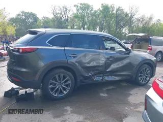 2020 Mazda CX-9 Signature with VIN JM3TCBEYXL0402053, listed as a IAAI auction lot 42070846 with 47,695 mi miles and . Bid and sale history available at DreamBid. Image 14.