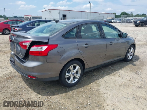 2013 Ford Focus SE z VIN 1FADP3F27DL267203, wystawiony jako IAAI lot #42470614 z przebiegiem 180 153 mil mil oraz . Historia ofert i sprzedaży dostępna na DreamBid. Obrazek 4.