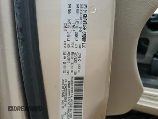 2015 Dodge Grand Caravan SXT with VIN 2C4RDGCG7FR536049, listed as a Copart auction lot 55963115 with 141,228 mi miles and Clean Title. Bid and sale history available at DreamBid. Image 13.
