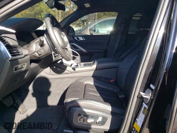 2023 BMW X6 xDrive40i z VIN 5UXCY6C04P9P46153, wystawiony jako Copart lot #81151634 z przebiegiem Nie podano mil oraz Szkoda całkowita • Salvage title. Historia ofert i sprzedaży dostępna na DreamBid. Obrazek 7.