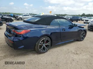 2023 BMW 4 Series M440i with VIN WBA53AT03PCL15153, listed as a Copart auction lot 49828855 with 7,354 mi miles and Salvage Title. Bid and sale history available at DreamBid. Image 3.