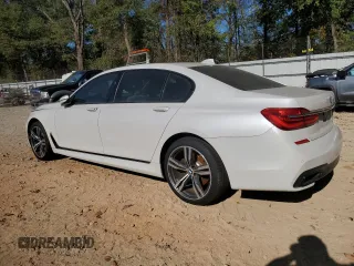 2016 BMW 7 Series 750i with VIN WBA7F0C58GGM20723, listed as a Copart auction lot 80143764 with 102,311 mi miles and Salvage Title. Bid and sale history available at carsss.com. Image 2.