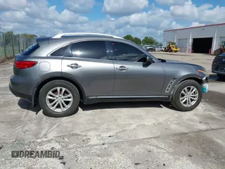 2013 Infiniti FX with VIN JN8CS1MU0DM140711, listed as a IAAI auction lot 40796518 with 179,386 mi miles and . Bid and sale history available at DreamBid. Image 14.
