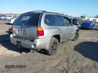 2002 GMC Envoy SLT with VIN 1GKDT13S822304832, listed as a IAAI auction lot 40874054 with 132,883 mi miles. Bid and sale history available at carsss.com. Image 4.