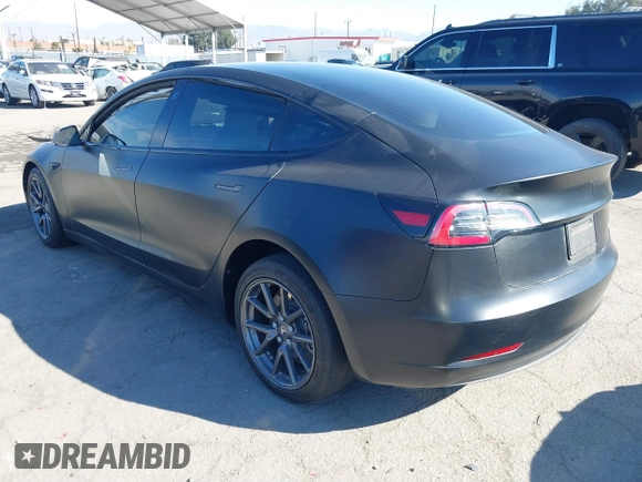 2019 Tesla Model 3 Mid Range with VIN 5YJ3E1EA0KF509547, listed as a IAAI auction lot 40720566 with 41,655 mi miles and . Bid and sale history available at DreamBid. Image 3.
