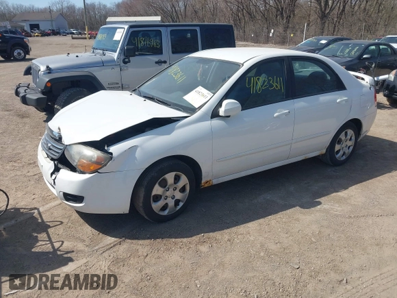2009 Kia Spectra EX with VIN KNAFE221X95624138, listed as a IAAI auction lot 41823611 with 136,790 mi miles. Bid and sale history available at carsss.com. Image 2.