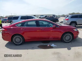 2014 Ford Fusion Titanium with VIN 3FA6P0K92ER293480, listed as a IAAI auction lot 41792642 with 156,828 mi miles. Bid and sale history available at carsss.com. Image 14.