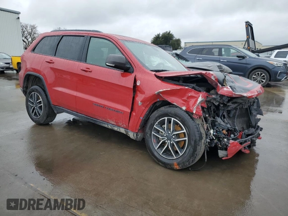 2020 Jeep Grand Cherokee Trailhawk with VIN 1C4RJFLG0LC116964, listed as a Copart auction lot 46117625 with 125,796 mi miles and Salvage title. Bid and sale history available at DreamBid. Image 4.