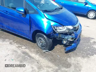 2020 Honda Fit LX z VIN 3HGGK5H43LM703494, wystawiony jako IAAI lot #42308518 z przebiegiem 67 452 mil mil oraz . Historia ofert i sprzedaży dostępna na DreamBid. Obrazek 6.