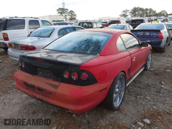 1995 Ford Mustang with VIN 1FALP4043SF160964, listed as a IAAI auction lot 41842585 with 221,359 mi miles. Bid and sale history available at carsss.com. Image 4.