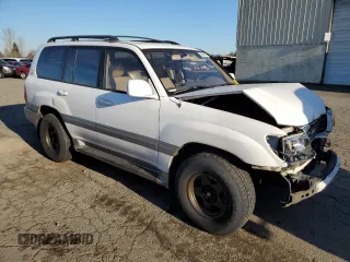 2000 Toyota Land Cruiser with VIN JT3HT05J5Y0105435, listed as a Copart auction lot 89409795 with 255,587 mi miles and Salvage Title. Bid and sale history available at carsss.com. Image 4.