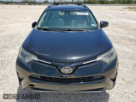 2018 Toyota RAV4 XLE with VIN 2T3WFREV7JW429716, listed as a Copart auction lot 64309045 with 156,445 mi miles and Salvage title. Bid and sale history available at DreamBid. Image 5.
