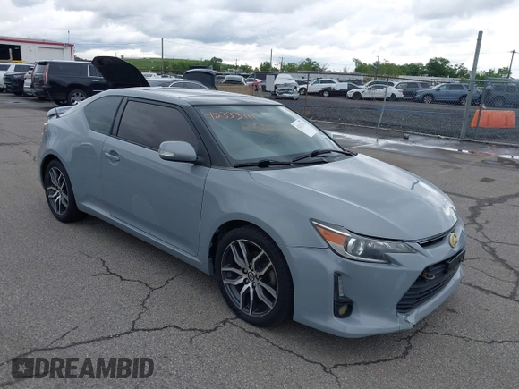 2014 Scion tC z VIN JTKJF5C71E3081033, wystawiony jako IAAI lot #42333111 z przebiegiem 144 124 mil mil oraz . Historia ofert i sprzedaży dostępna na DreamBid. Obrazek 1.