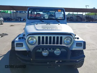 2002 Jeep Wrangler X with VIN 1J4FA39S42P763835, listed as a IAAI auction lot 42302645 with 233,634 mi miles and . Bid and sale history available at DreamBid. Image 13.