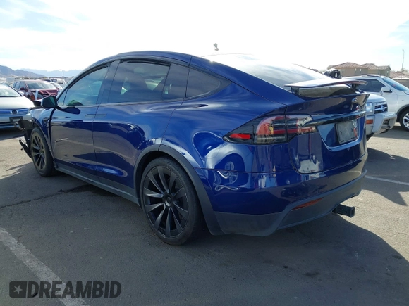 2022 Tesla Model X with VIN 7SAXCDE58NF341112, listed as a IAAI auction lot 41632491 with Not Provided miles and . Bid and sale history available at DreamBid. Image 3.