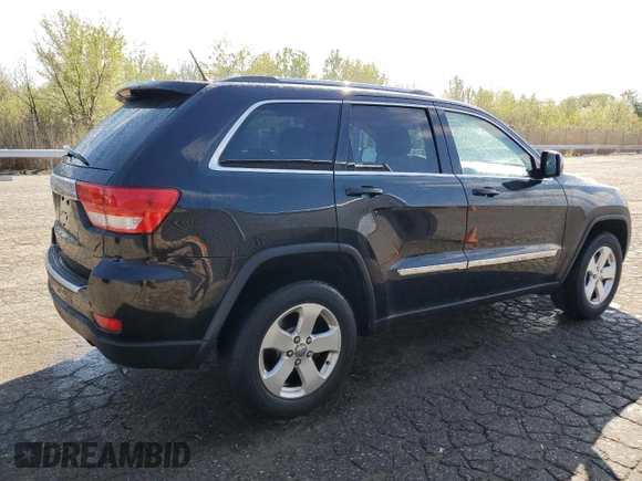 2012 Jeep Grand Cherokee Laredo with VIN 1C4RJFAG4CC203267, listed as a Copart auction lot 54910285 with 143,289 mi miles and Clean Title. Bid and sale history available at carsss.com. Image 3.