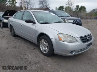 2003 Nissan Altima S with VIN 1N4AL11D33C265538, listed as a IAAI auction lot 42082079 with 180,138 mi miles. Bid and sale history available at carsss.com. Image 1.