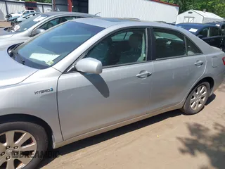 2007 Toyota Camry with VIN 4T1BB46KX7U020015, listed as a IAAI auction lot 42411157 with 256,430 mi miles and . Bid and sale history available at DreamBid. Image 6.