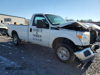 2012 Ford F-250 XL with VIN 1FTBF2A62CEB65027, listed as a Copart auction lot 87708765 with 119,132 mi miles and Salvage title. Bid and sale history available at DreamBid. Image 4.