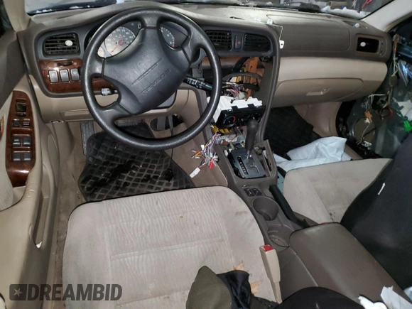2002 Subaru Legacy Outback с VIN 4S3BH675327661571, выставлен на аукционе Copart как лот 87742795 с пробегом Не указан миль и Списание • Salvage title. История ставок и продаж доступна на DreamBid. Изображение 8.