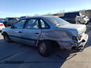 1991 Ford Taurus z VIN 1FACP52U3MA237495, wystawiony jako Copart lot #82519194 z przebiegiem 41 048 mil mil oraz Czysty tytuł • Clean title. Historia ofert i sprzedaży dostępna na DreamBid. Obrazek 2.