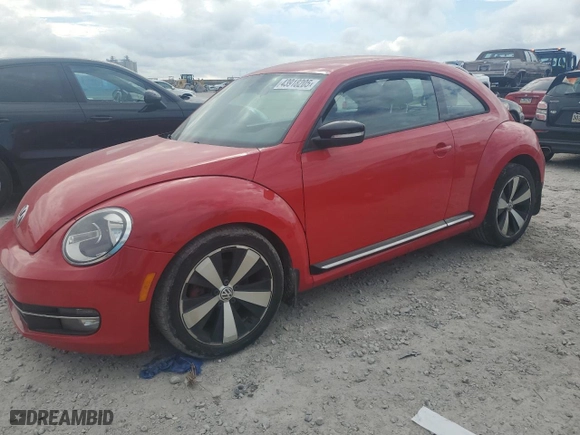 2012 Volkswagen Beetle 2.0T Turbo w/Sun/Sound with VIN 3VWV67ATXCM651866, listed as a Copart auction lot 43918205 with 94,896 mi miles and Salvage Title. Bid and sale history available at carsss.com. Image 1.