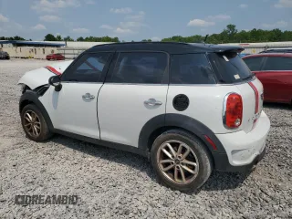 2015 MINI Countryman S with VIN WMWZC3C55FWT03267, listed as a Copart auction lot 59331605 with 116,964 mi miles and Salvage title. Bid and sale history available at DreamBid. Image 2.