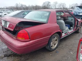 2002 Ford Crown Victoria LX z VIN 2FAFP74W82X148324, wystawiony jako IAAI lot #41565717 z przebiegiem 114 536 mil mil oraz . Historia ofert i sprzedaży dostępna na DreamBid. Obrazek 4.