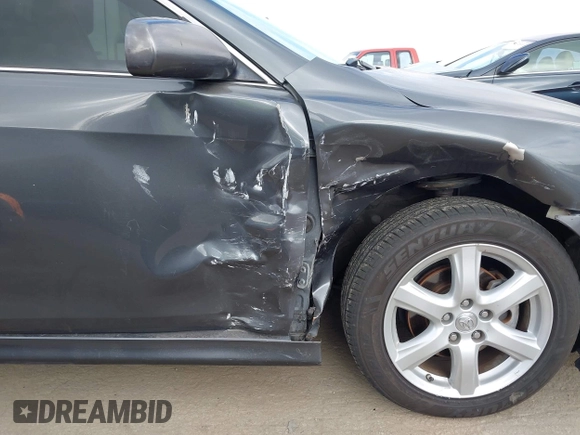 2007 Toyota Camry CE with VIN 4T1BE46K27U601564, listed as a IAAI auction lot 42125601 with 145,246 mi miles and . Bid and sale history available at DreamBid. Image 6.
