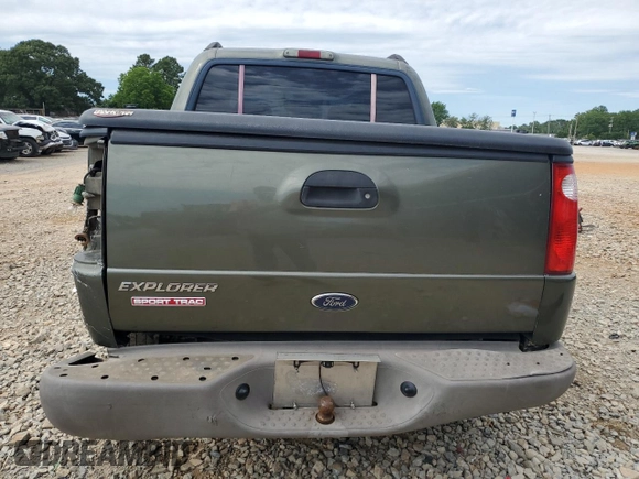 2001 Ford Explorer Sport Trac with VIN 1FMZU67E61UC73126, listed as a Copart auction lot 58207385 with 163,915 mi miles and Salvage title. Bid and sale history available at DreamBid. Image 6.