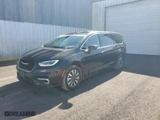 2023 Chrysler Pacifica Hybrid Touring L with VIN 2C4RC1L7XPR592181, listed as a Copart auction lot 52144505 with 45,770 mi miles and Salvage Title. Bid and sale history available at carsss.com. Image 1.