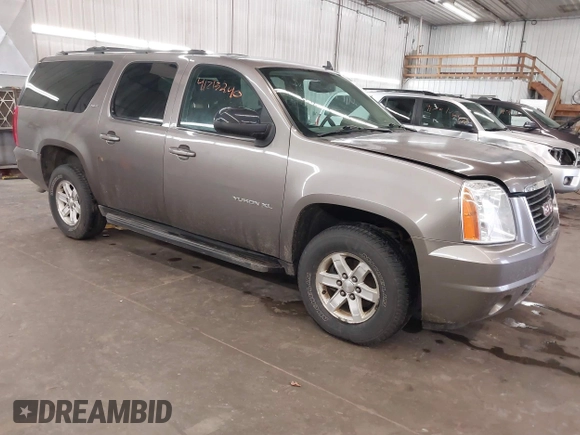 2013 GMC Yukon XL SLT with VIN 1GKS2KE71DR213758, listed as a IAAI auction lot 41713240 with 193,611 mi miles. Bid and sale history available at carsss.com. Image 1.