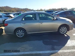 2009 Toyota Corolla with VIN 1NXBU40E59Z164488, listed as a IAAI auction lot 40907058 with 180,161 mi miles. Bid and sale history available at carsss.com. Image 13.