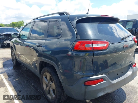 2016 Jeep Cherokee Latitude with VIN 1C4PJLCBXGW284156, listed as a IAAI auction lot 42264152 with 117,327 mi miles and . Bid and sale history available at DreamBid. Image 3.