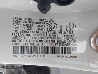 2020 Honda Civic LX with VIN 2HGFC2F69LH521681, listed as a IAAI auction lot 41664332 with 37,038 mi miles and . Bid and sale history available at DreamBid. Image 9.