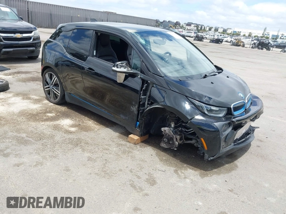 2017 BMW i3 z VIN WBY1Z8C5XHV889564, wystawiony jako IAAI lot #42239516 z przebiegiem 54 400 mil mil oraz . Historia ofert i sprzedaży dostępna na DreamBid. Obrazek 1.