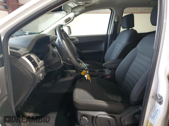 2023 Ford Ranger XL with VIN 1FTER4FHXPLE05663, listed as a Copart auction lot 60577925 with 29,218 mi miles and Salvage title. Bid and sale history available at DreamBid. Image 7.