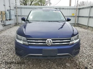 2021 Volkswagen Tiguan SE z VIN 3VV2B7AX3MM154049, wystawiony jako Copart lot #52961955 z przebiegiem 77 349 mil mil oraz Czysty tytuł • Clean title. Historia ofert i sprzedaży dostępna na DreamBid. Obrazek 5.